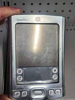 Front view of Palm Tungsten T showing screen, hard buttons, and navigation pad