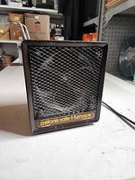 Front view of Pelonis Safe-T-Furnace heater showing mesh grille and branding