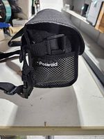 Polaroid branded carry case front with mesh pocket