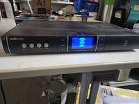 Front view showing display, buttons, Polk Audio branding