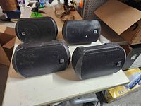 Front view of four Turbosound speakers