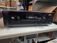 Front view showing Sony branding, display illumination and control layout