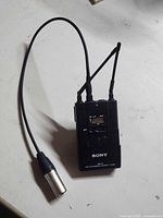 Front view of Sony URX-P2 tuner with antennas and cable
