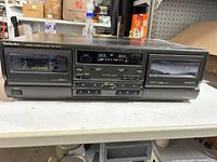 Front view showing two tape decks, controls and display