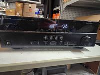 Front view of Yamaha RX-V377 showing controls, inputs and display