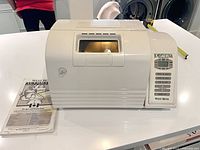 Bread maker and manual overall view