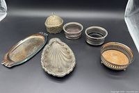 Group shot of all six silver-plated pieces