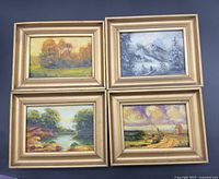 All four framed paintings displayed together