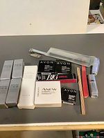All boxed cosmetics and manicure tools grouped on surface
