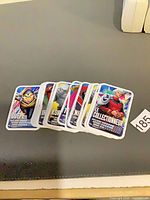 Stack of Marvel French-language trading cards, front card Guêpe visible