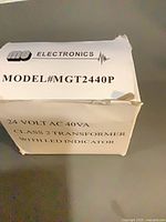 Front view of boxed MG Electronics MGT2440P transformer