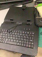 Folio keyboard case open showing keys and connector