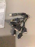 Full view of cable showing USB A male input and multiple output connectors