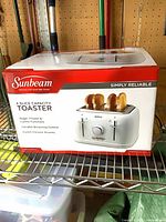 Front view of sealed Sunbeam toaster box