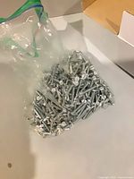 Bag of loose zinc-plated screws