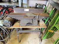 Full view of benchtop jointer with motor on stand