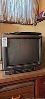 JVC CRT TV with Sony DVD player stacked on top