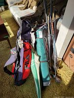 Two carry bags with visible clubs
