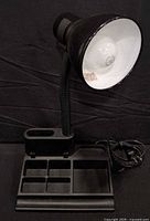 Front view of lamp showing organizer compartments and shade