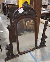 Full view of mirror with two separate carved side supports