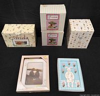 Group shot of five boxed ceramic Easter items