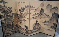Full view of six-panel folding screen showing entire landscape artwork