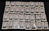 Wide view showing 35 bundles of identical Chris Hoiles Upper Deck cards