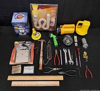 overview of all items laid out on black background