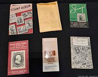 Front view of five stamp booklets and envelope