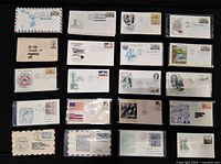 Full view of the 20 stamped covers laid in four columns by five rows