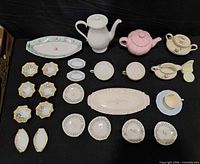 Full layout of all tea service pieces