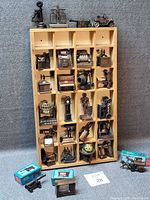 Full cabinet with pencil sharpeners and boxed pieces
