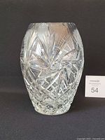Front view of cut crystal vase showing starburst pattern