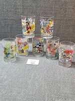 All seven Disney character glasses pyramid arrangement