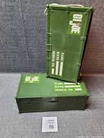 Two closed green GI Joe storage boxes