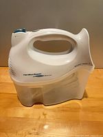 Mixer attached to storage case, right side view