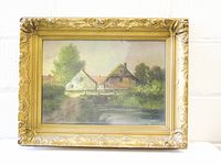 Front view of framed painting showing artwork and ornate gilt frame