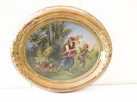 Front view of oval painting showing scene and frame damage