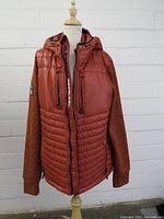 Front view of Superdry hybrid jacket on mannequin