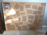 Full view of cork bulletin board with frame