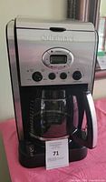 Front view of Cuisinart coffee maker showing controls and carafe
