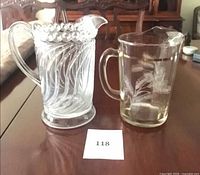 Both pitchers side by side to show size, pattern and condition