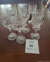All 8 Stuart Crystal aperitif glasses on table