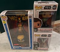 Group view of three boxed Funko Pop figures