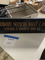 Overall lot showing wooden sign, baskets, plate hanger