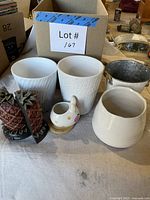 All five planters and both pineapple bookends grouped together