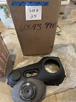 Shipping box and both Harley parts visible