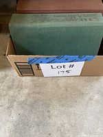 Three cloth hardcovers inside box