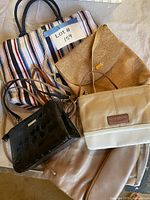 Group shot of all five bags showing variety