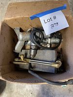 Box overview showing drill, impact wrench, blow gun and other items